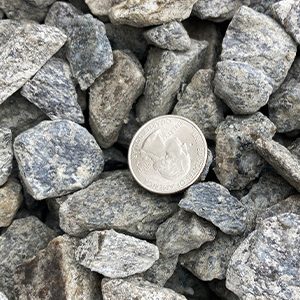 Our grey crushed stone is another sharp stone alternative. It compacts and is better for foundation drip edges. It is not a washed product but works well for most drainage applications.  