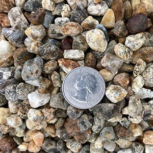 A decorative stone used for dressing pathways and driveways. A good product for foot traffic if bare feet are common such as a pool area.